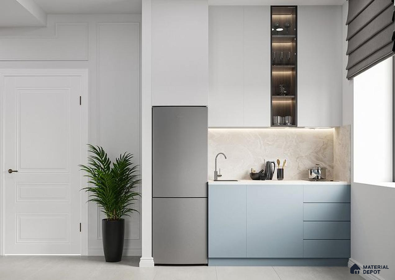 A kitchen with marble counter tops and wooden cabinetry, along with an island in the middle of the middle of the island with stairs leading to shop & more counter top space to an island in the middle of